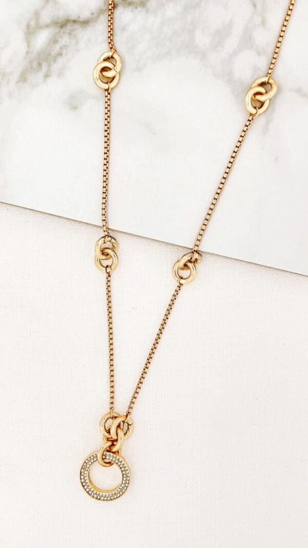 Envy Long Necklace with Knot Detail and Diamante Circle Pendantnt