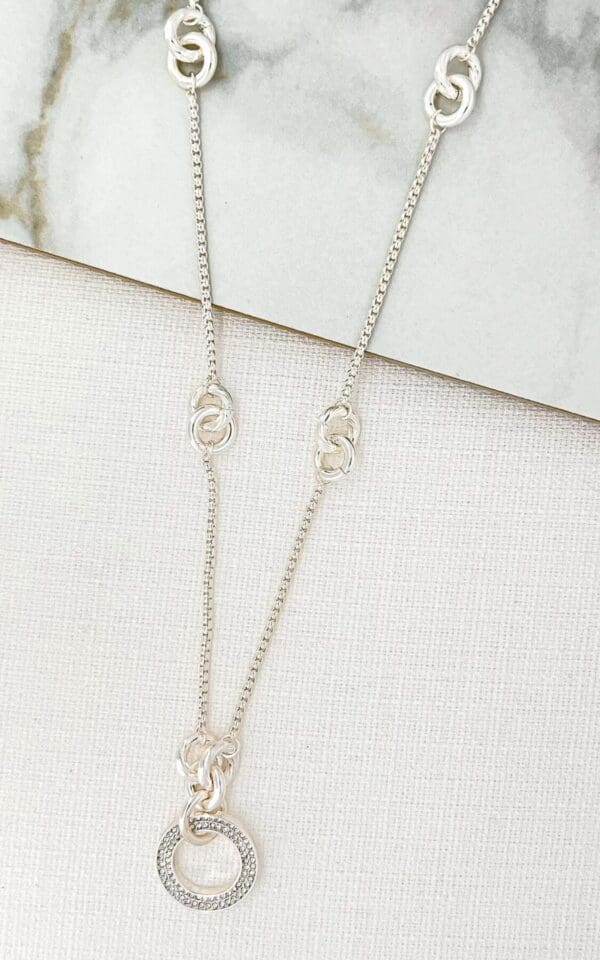 Envy Long Necklace with Knot Detail and Diamante Circle Pendant