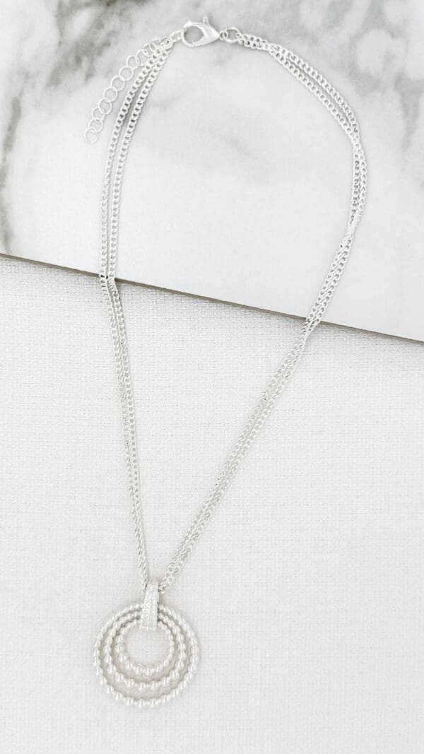 Envy Silver beaded ring necklace