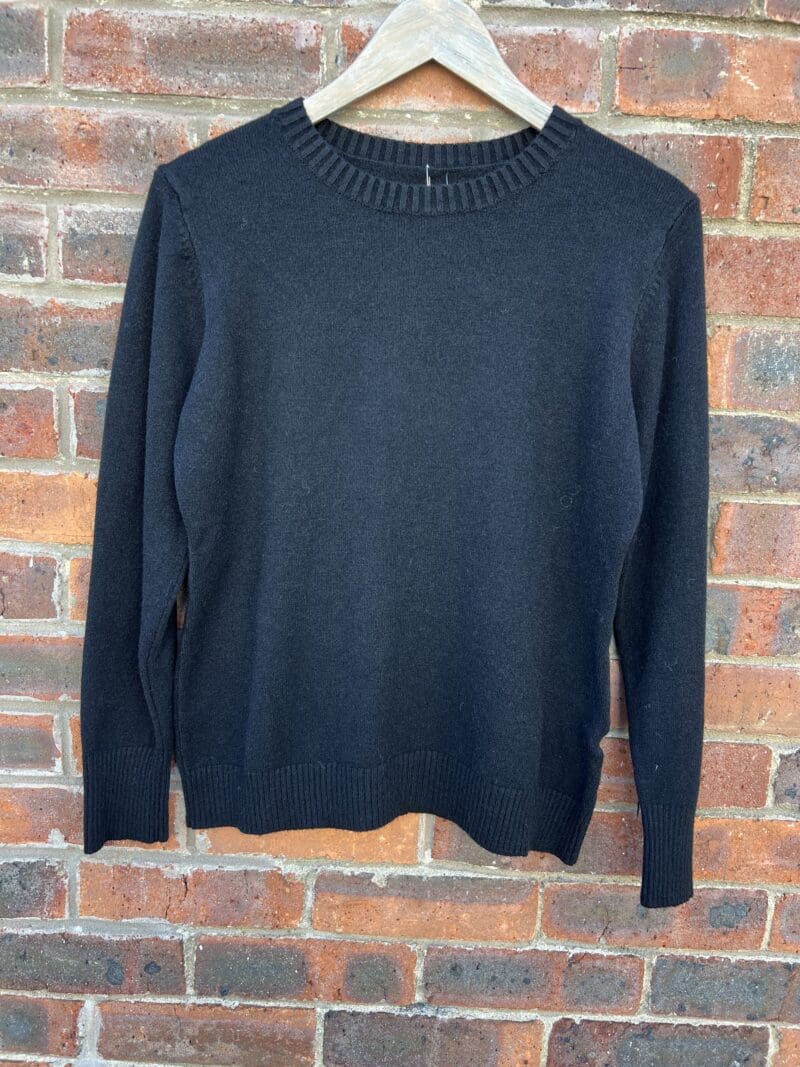 Classic super soft knit with button detail on sleeve